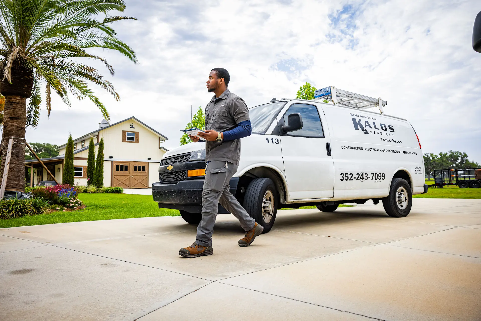Kalos Tech Walking up to customer house