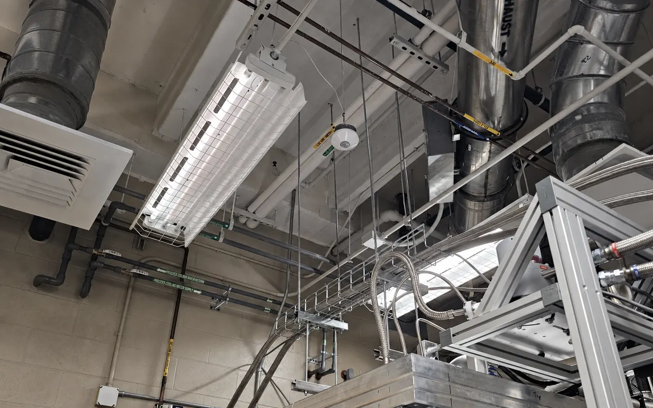 Stainless-steel chilled-water piping serving precision research equipment