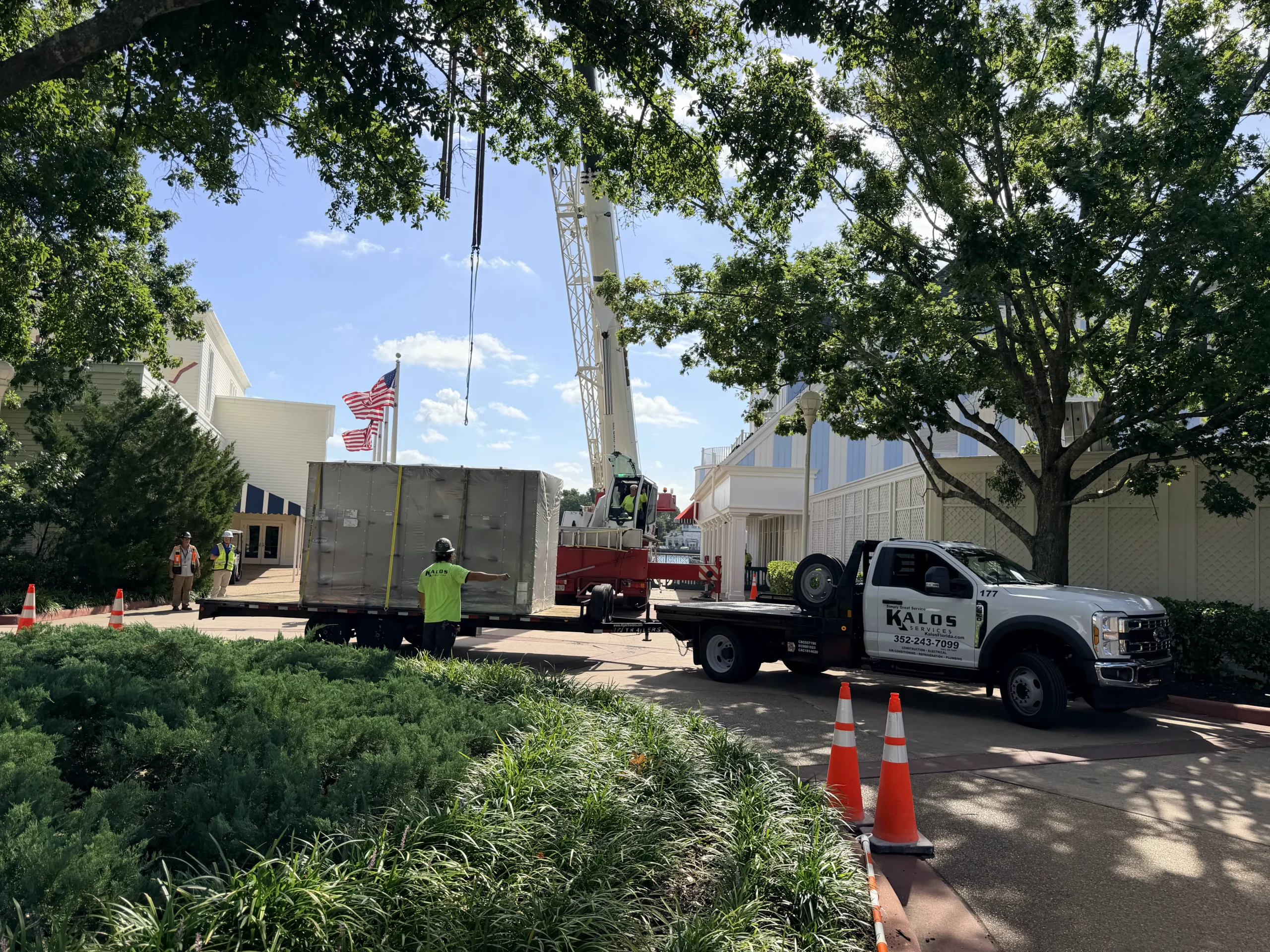 Kalos technician servicing a commercial rooftop HVAC unit in Central Florida