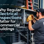 Electrician working on commercial building electrical box